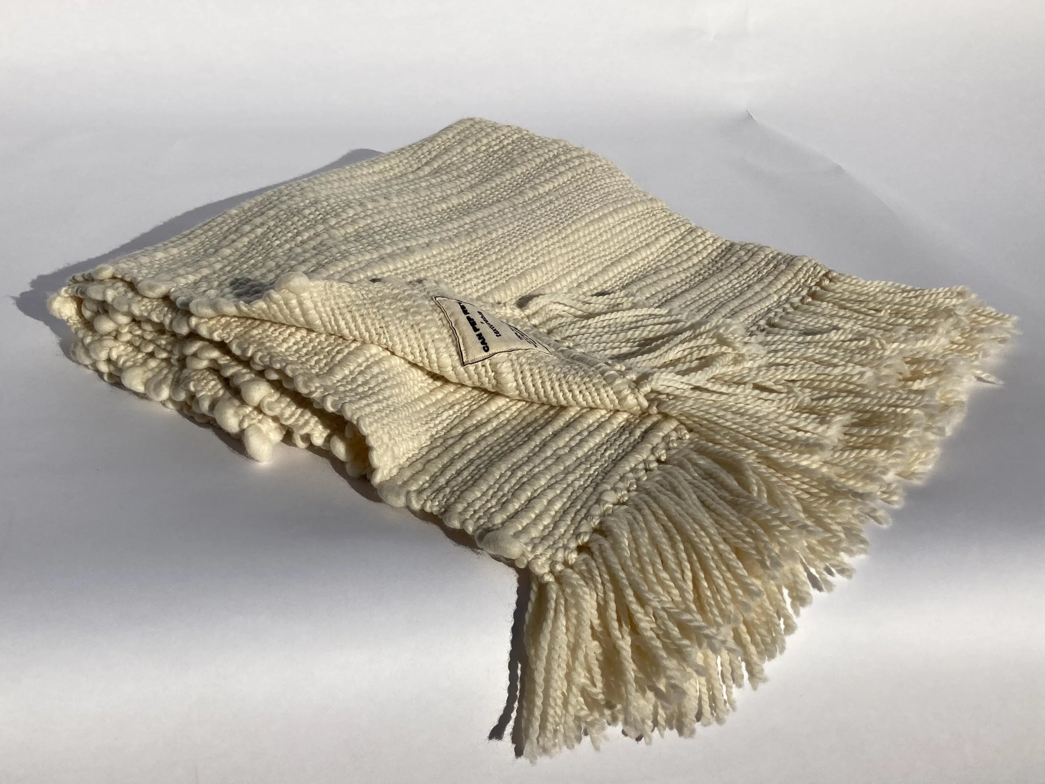 Merino wool blanket in ecru by can pep rey