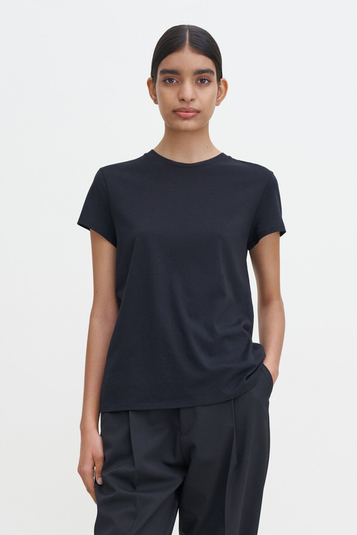 Soft cotton tee in black by Filippa K