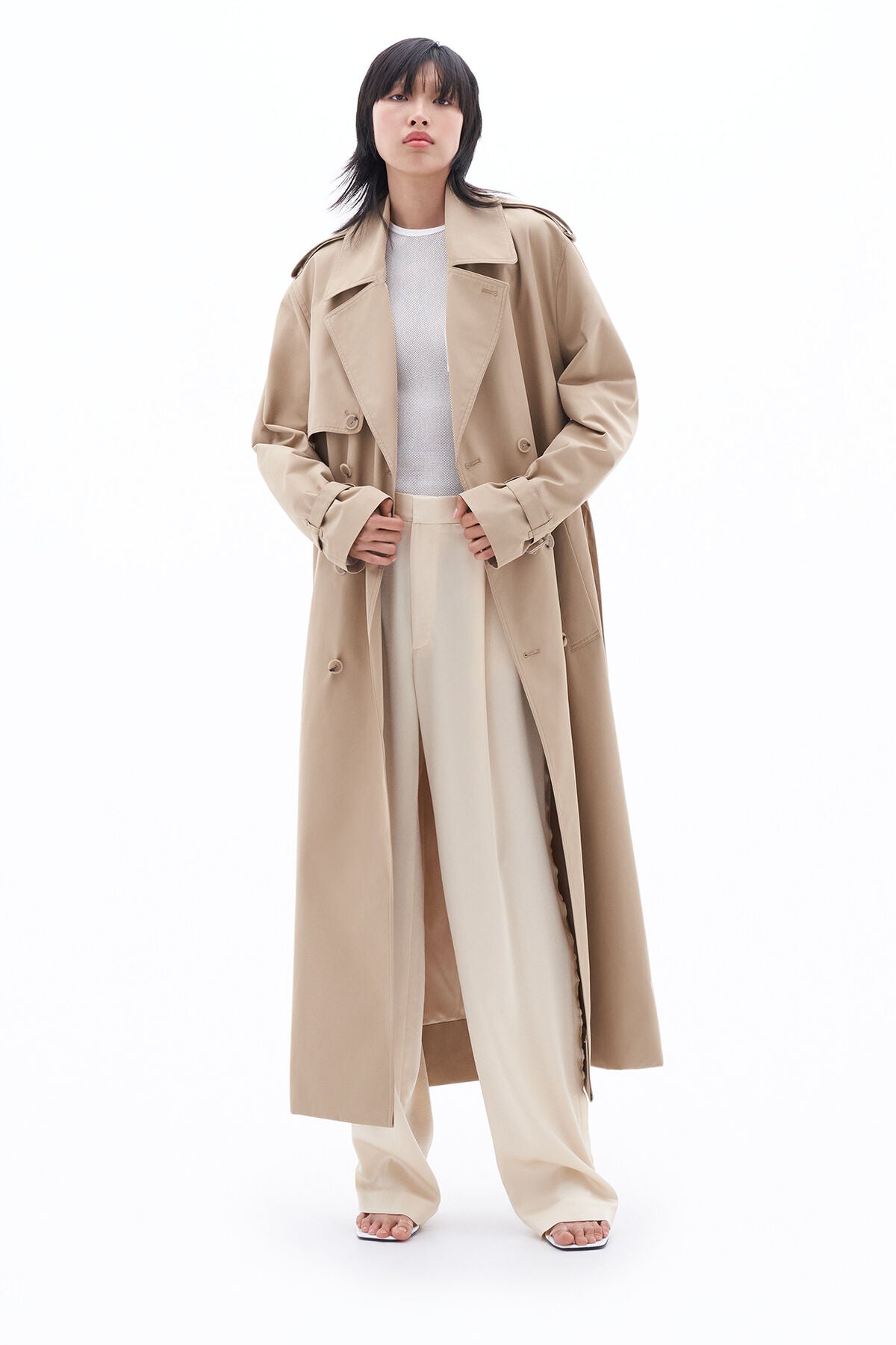 Trench coat in sand