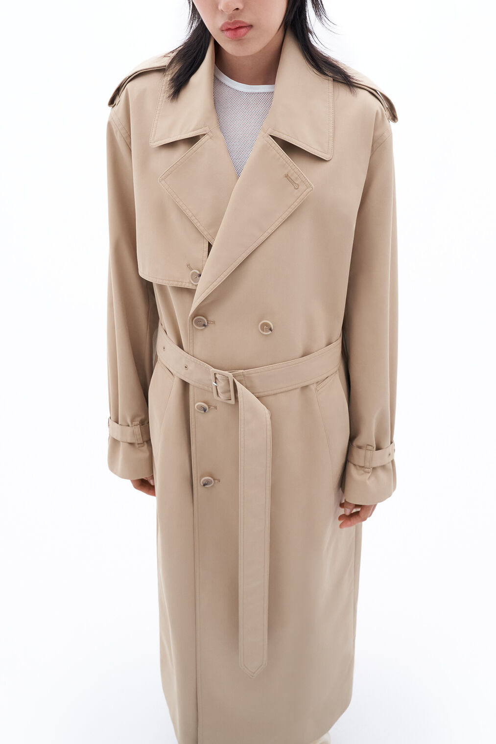 Trench coat in sand