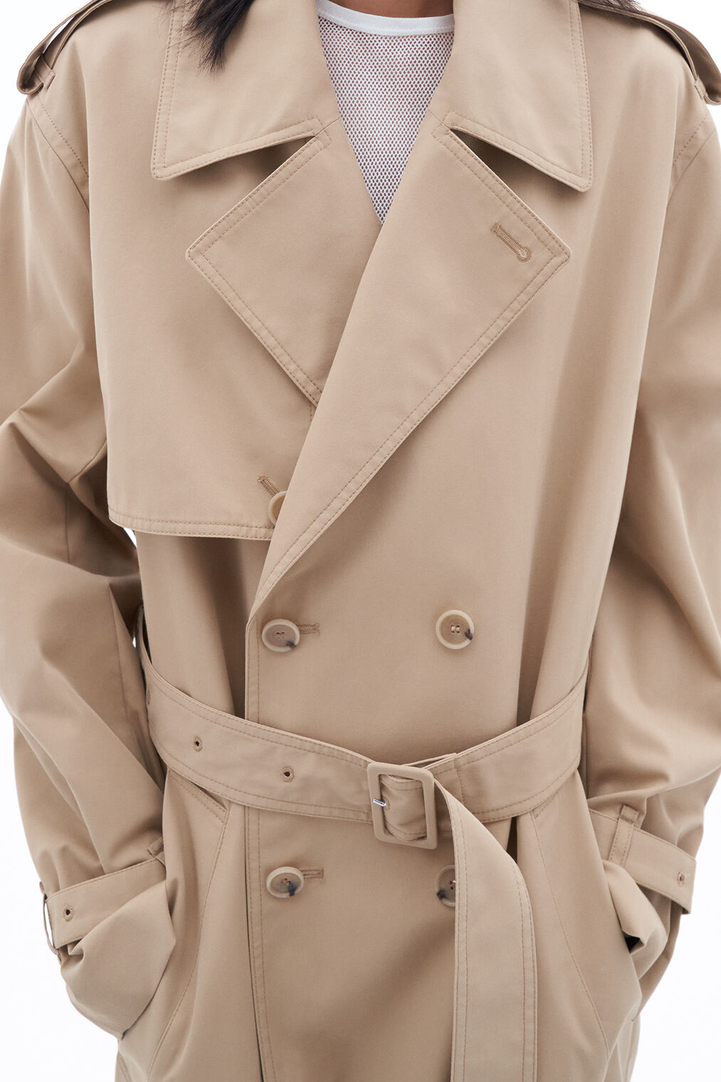 Trench coat in sand