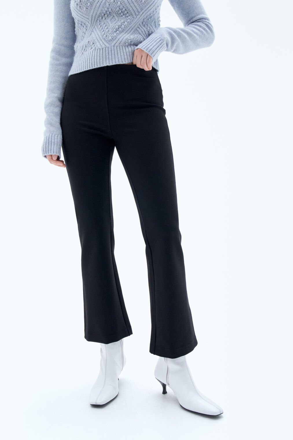 Flared jersey trousers in black