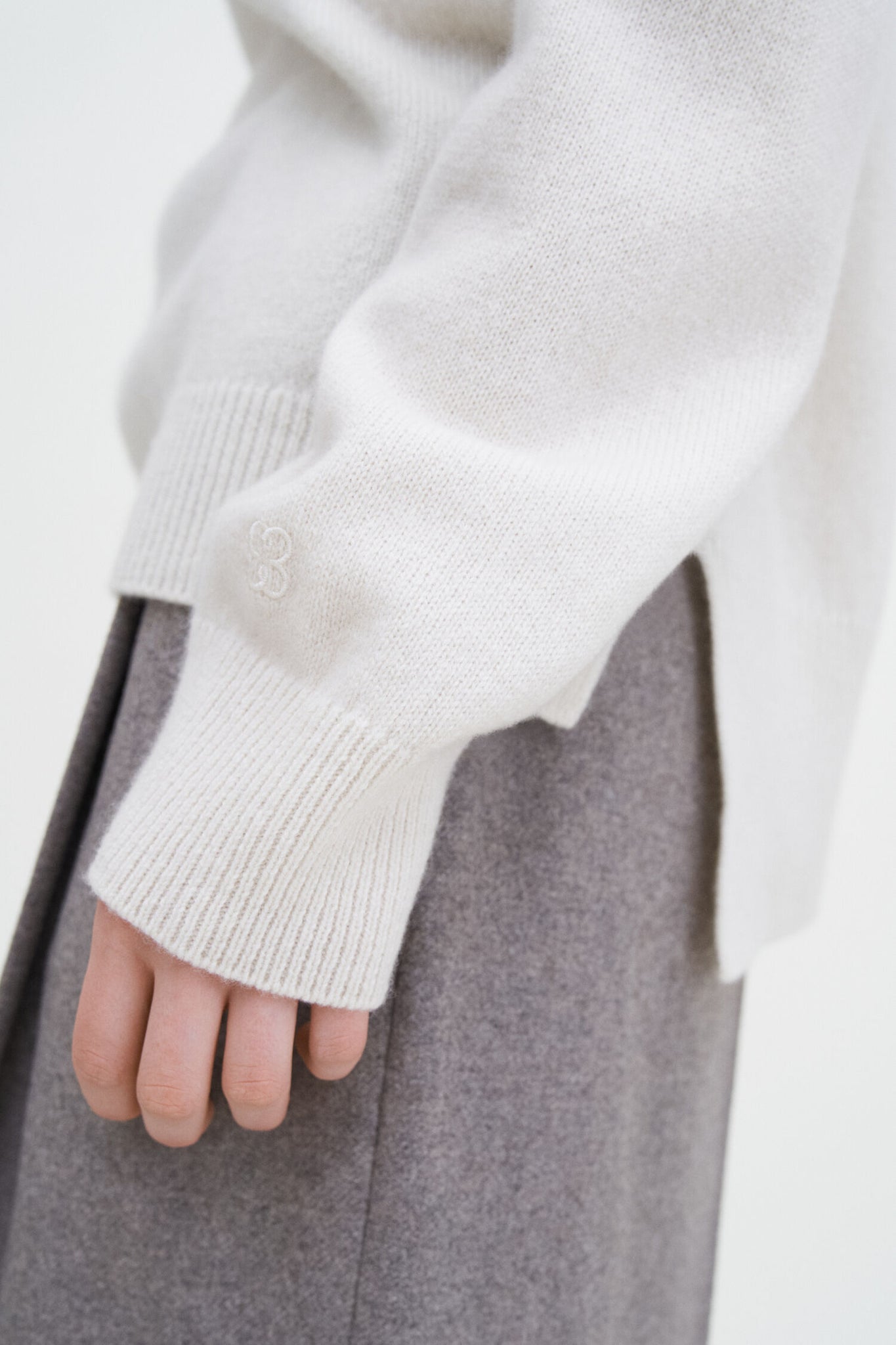 Relaxed turtleneck sweater in off white