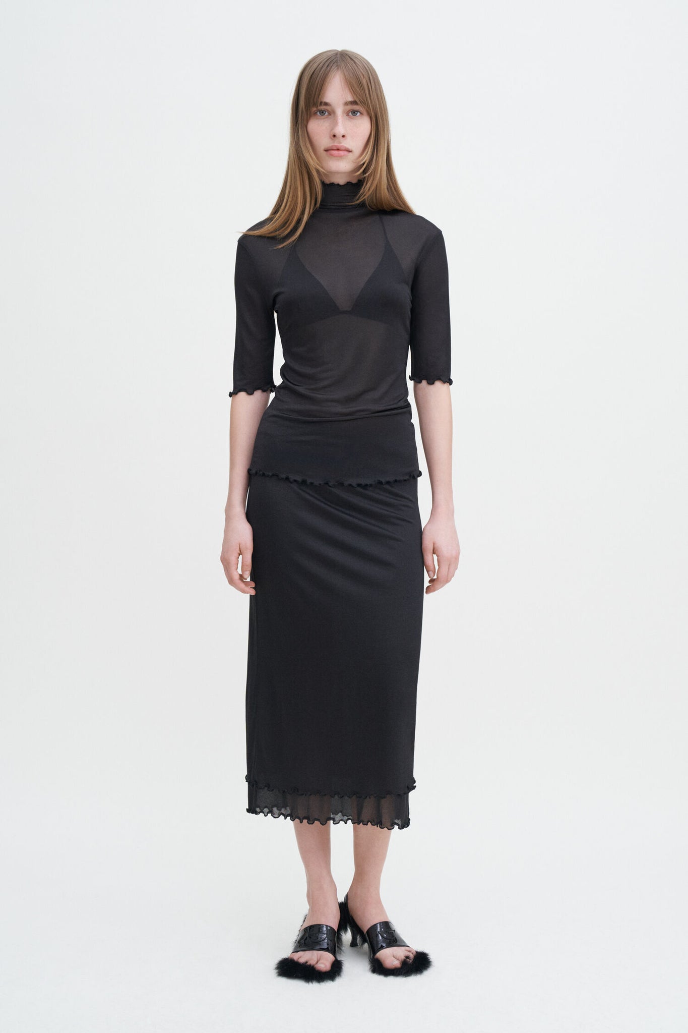 Mock neck frill top in black by Filippa K