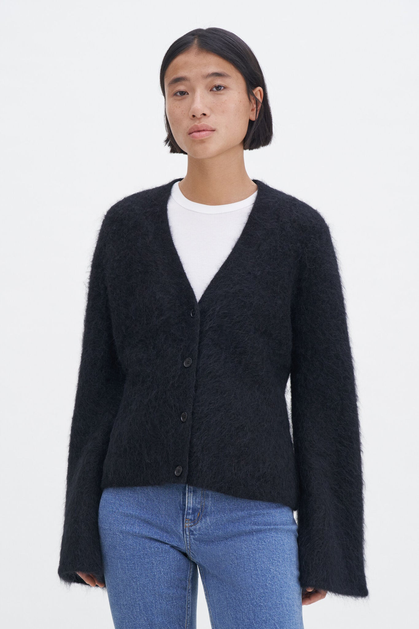 Fluffy cardigan in black by Filippa K