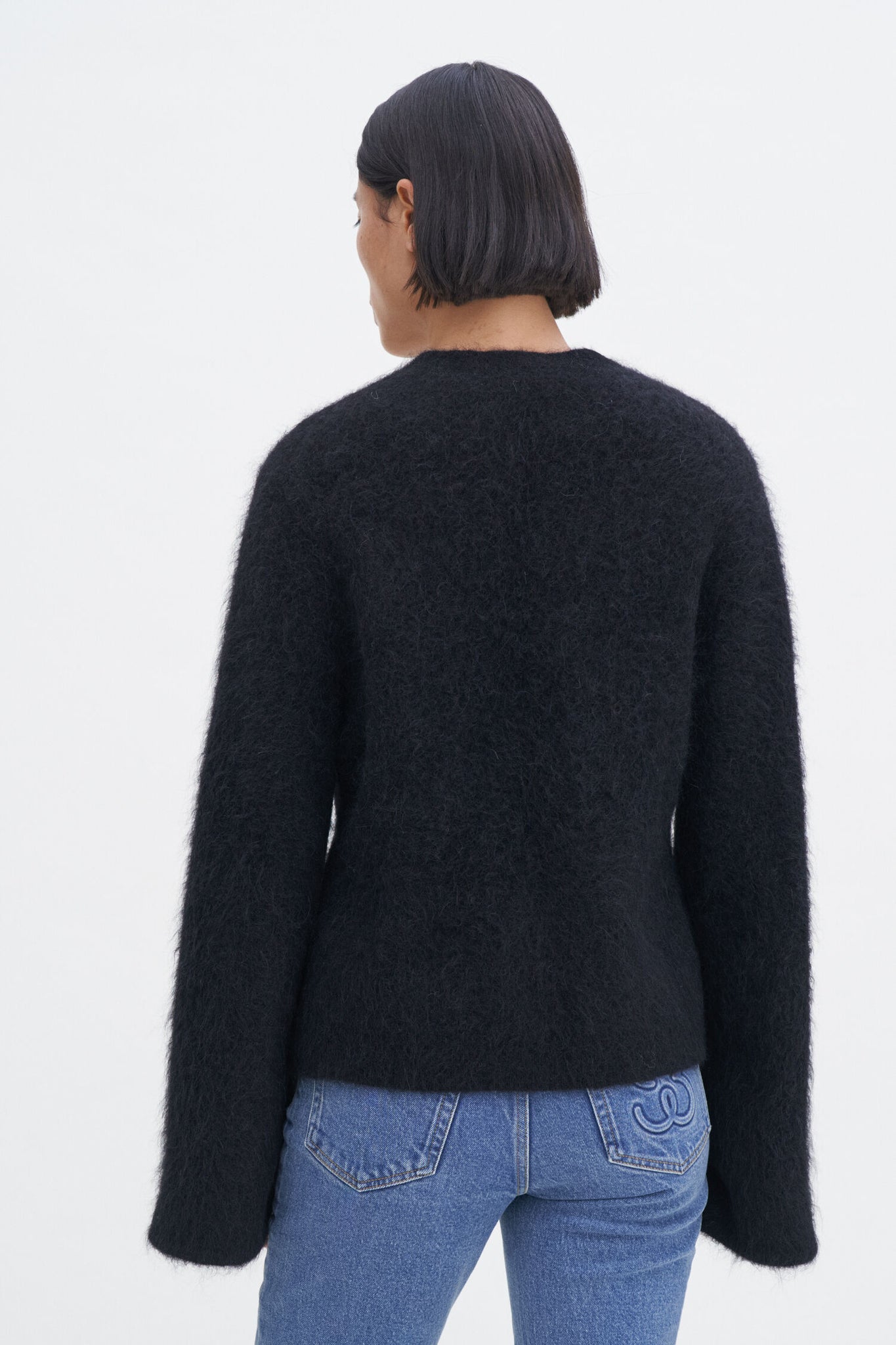 Fluffy cardigan in black by Filippa K