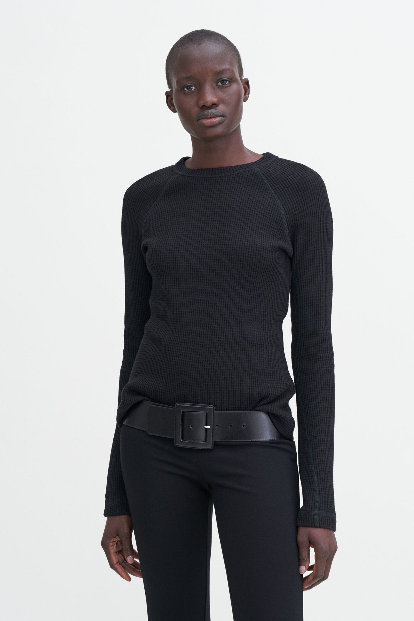 Waffle sweater in black by Filippa K