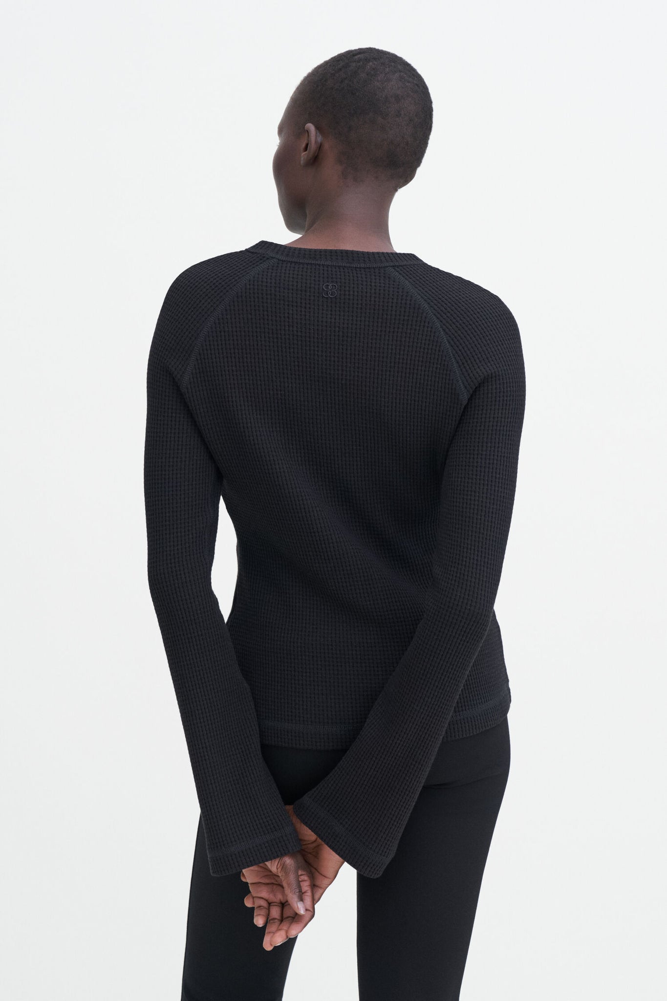 Waffle sweater in black by Filippa K
