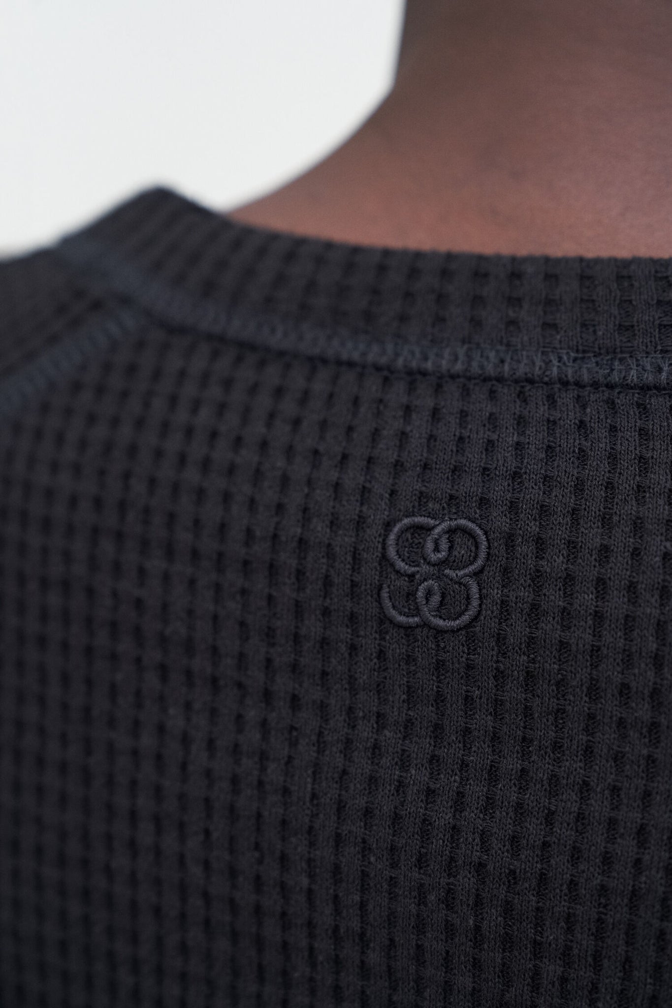 Waffle sweater in black by Filippa K