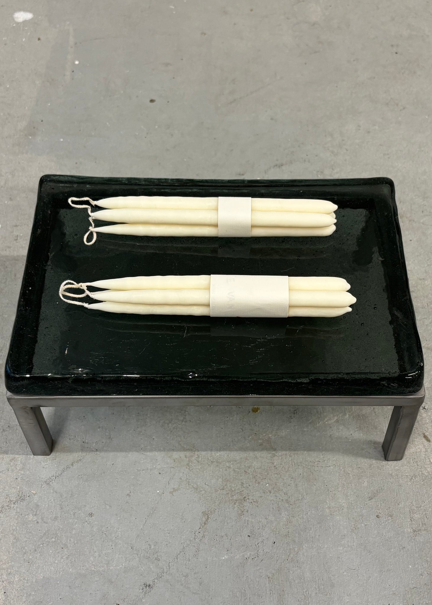 Four hand dipped candles by Malte van der Meyden