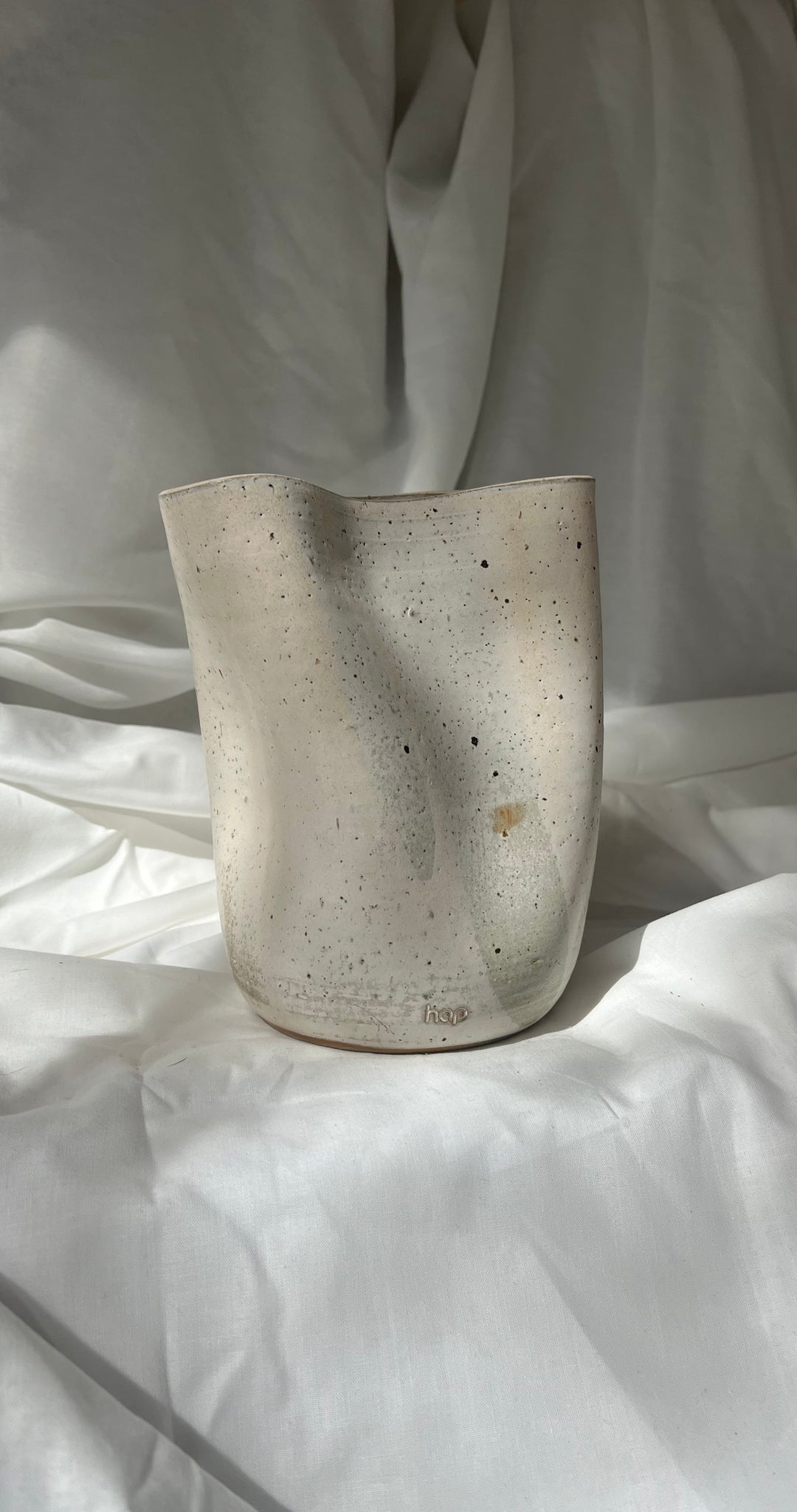 Deformed vase in beige by hap