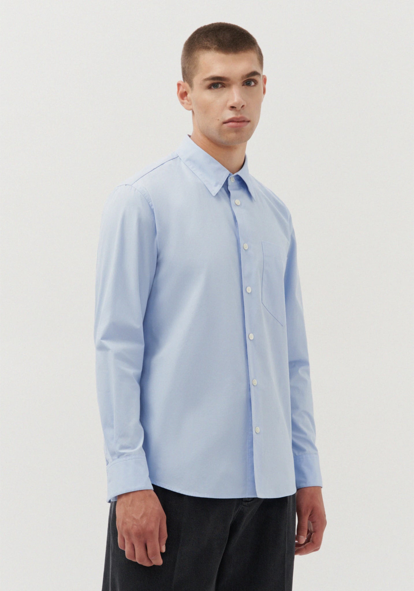 Gender neutral shirt in light blue by Studio Seidensticker
