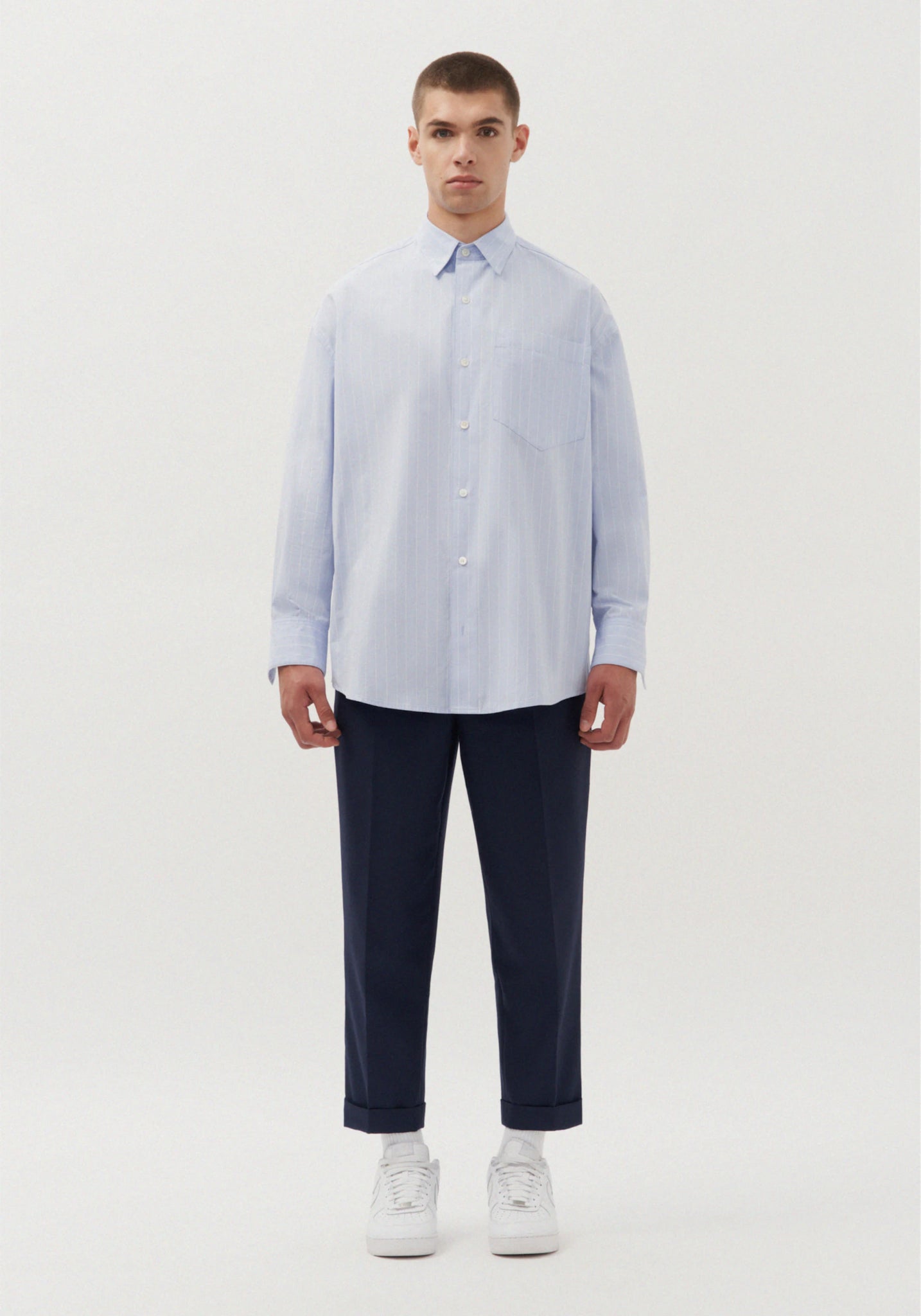 Gender neutral oversized shirt in blue stripes by Studio Seidensticker