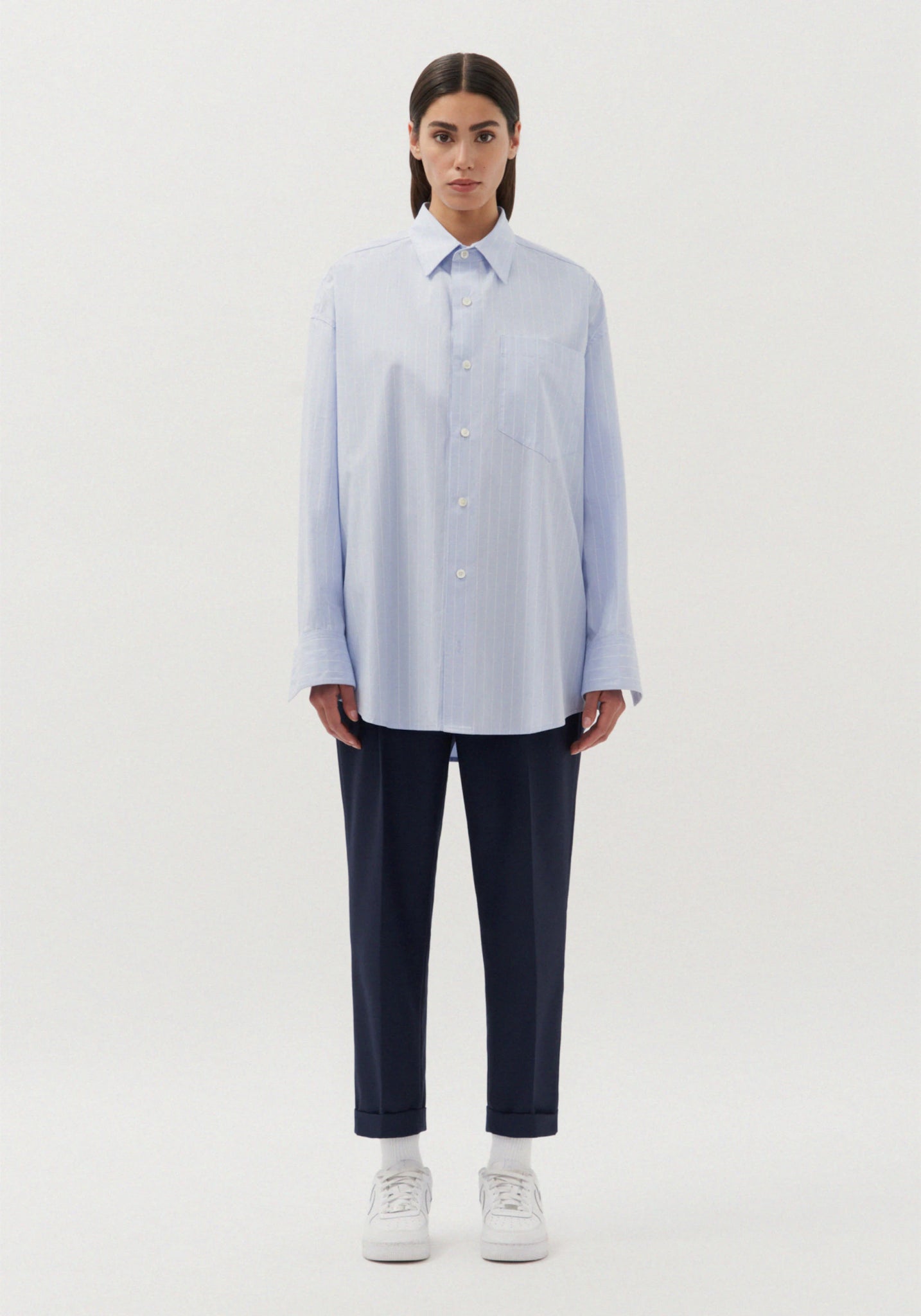 Gender neutral oversized shirt in blue stripes by Studio Seidensticker
