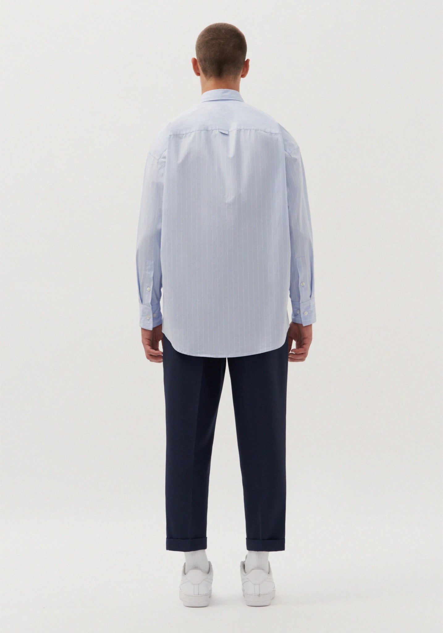 Gender neutral oversized shirt in blue stripes by Studio Seidensticker
