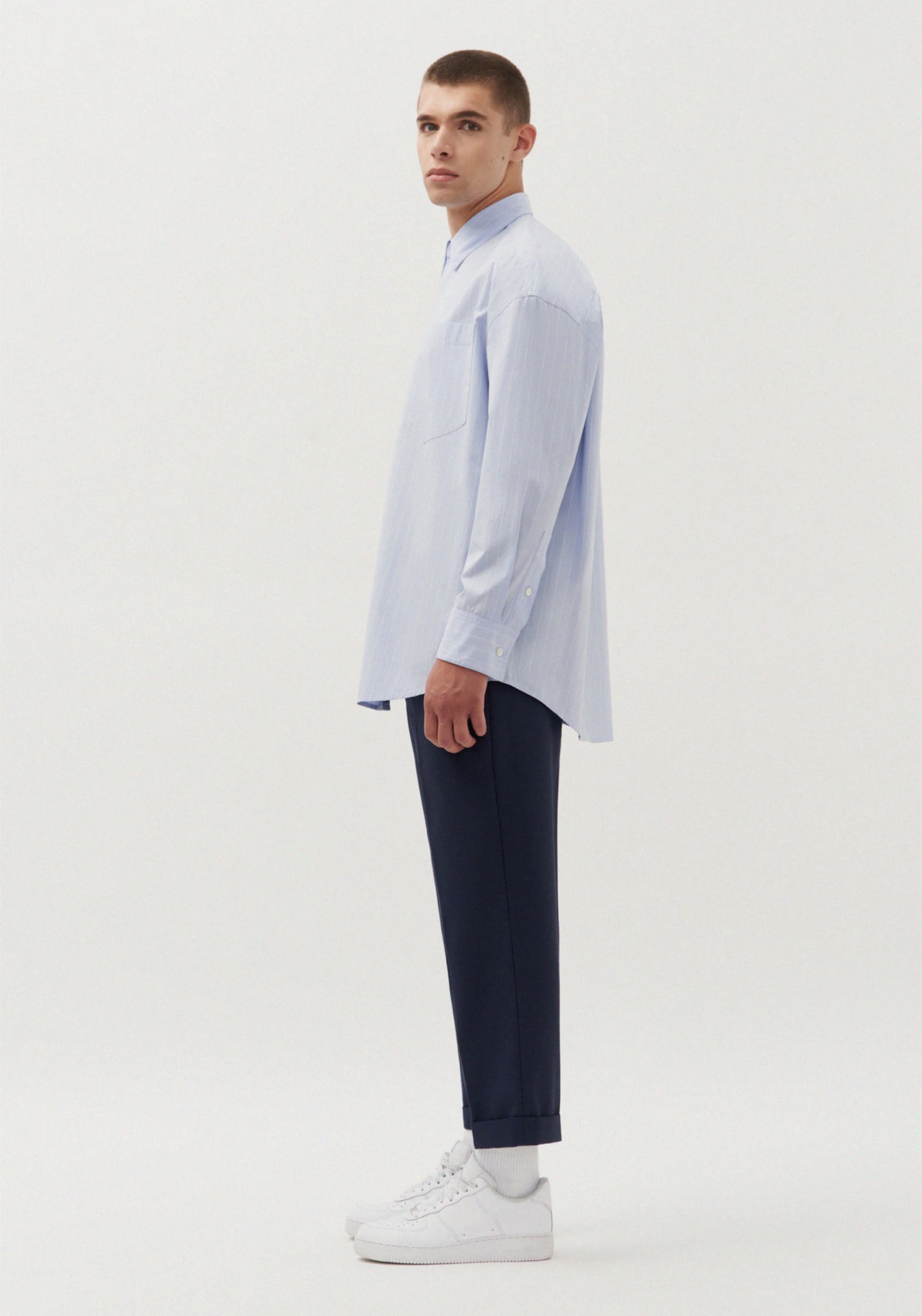 Gender neutral oversized shirt in blue stripes by Studio Seidensticker