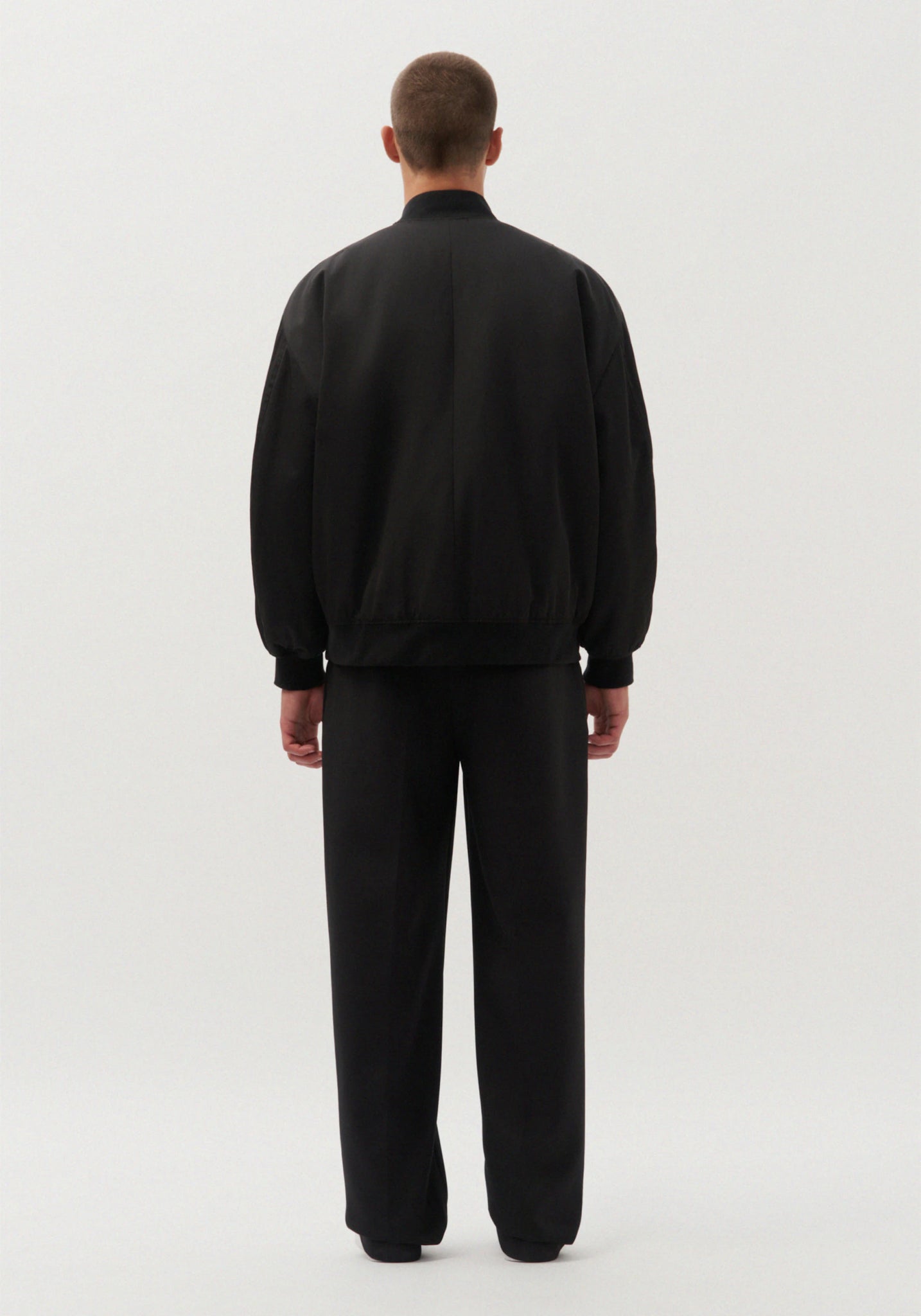 Oversized bomber jacket in black by Studio Seidensticker