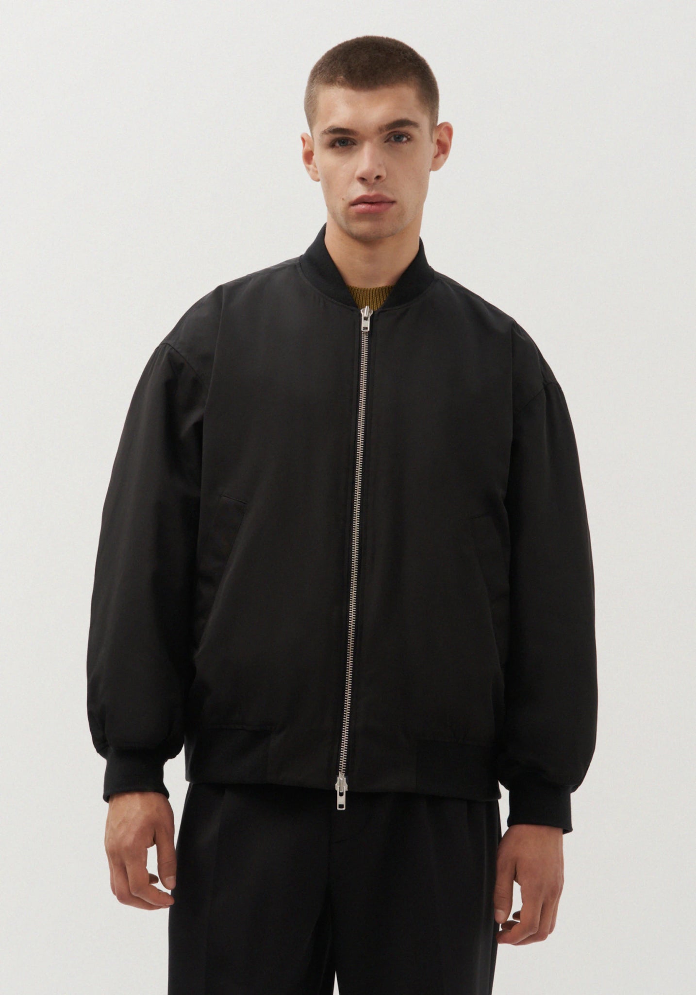 Oversized bomber jacket in black by Studio Seidensticker