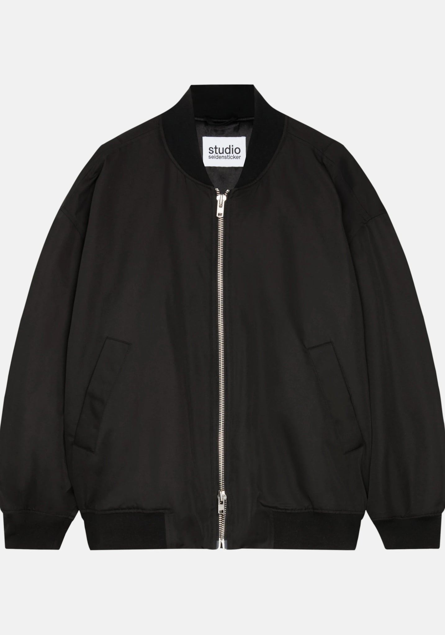 Oversized bomber jacket in black by Studio Seidensticker