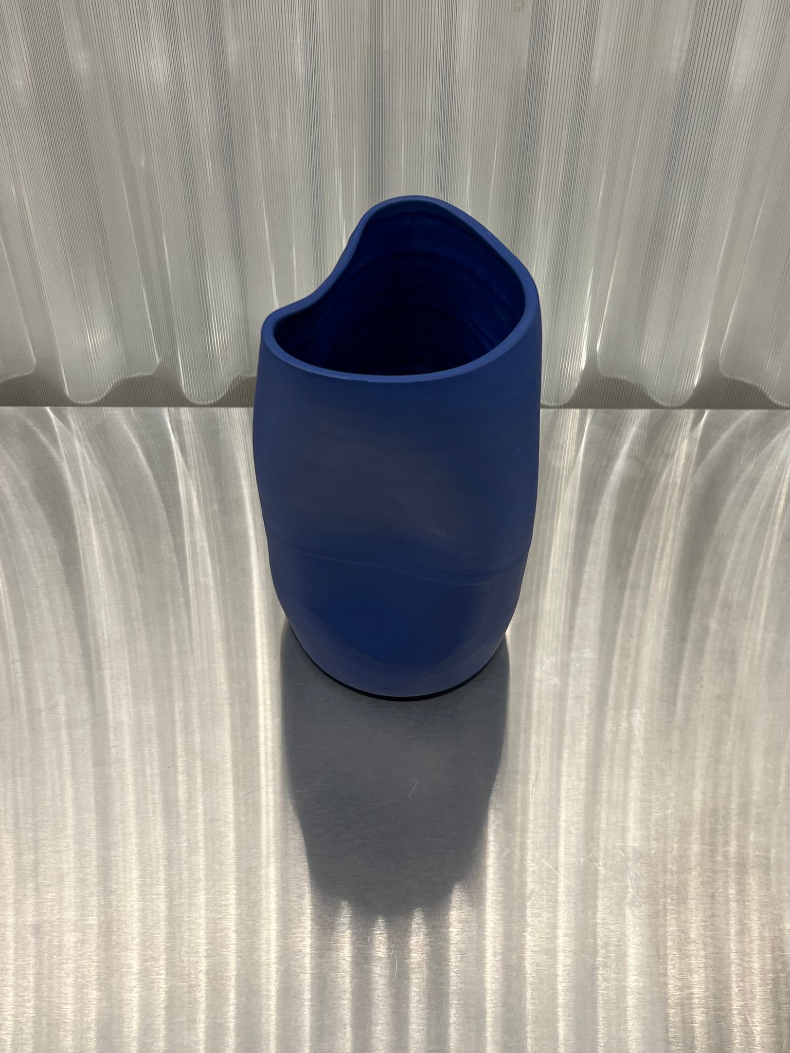 Deformed vase medium in blue by Hap Ceramics