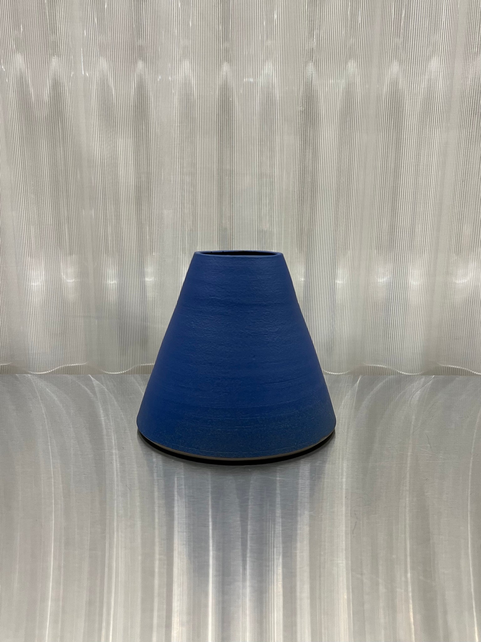 Cone shape vase in blue by Hap Ceramics