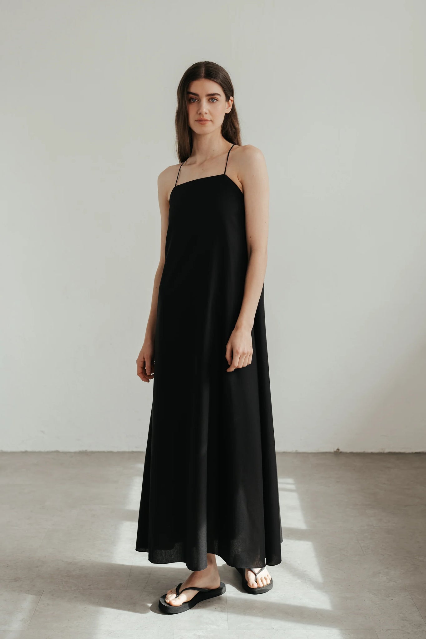 Backless maxi dress in black by sonho stories
