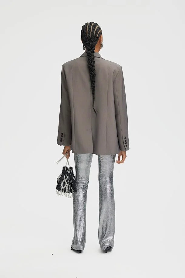 Flared pants in silver structure