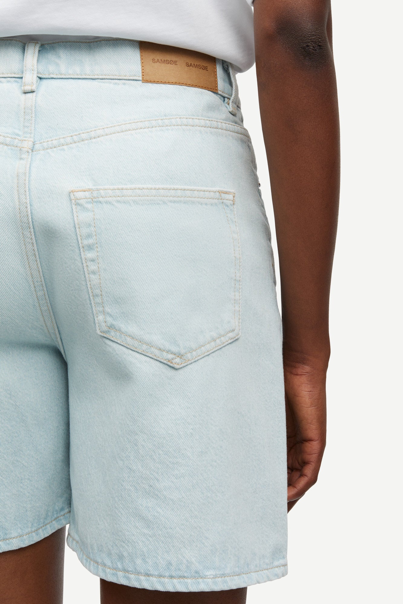 Sashelly shorts in surf spray