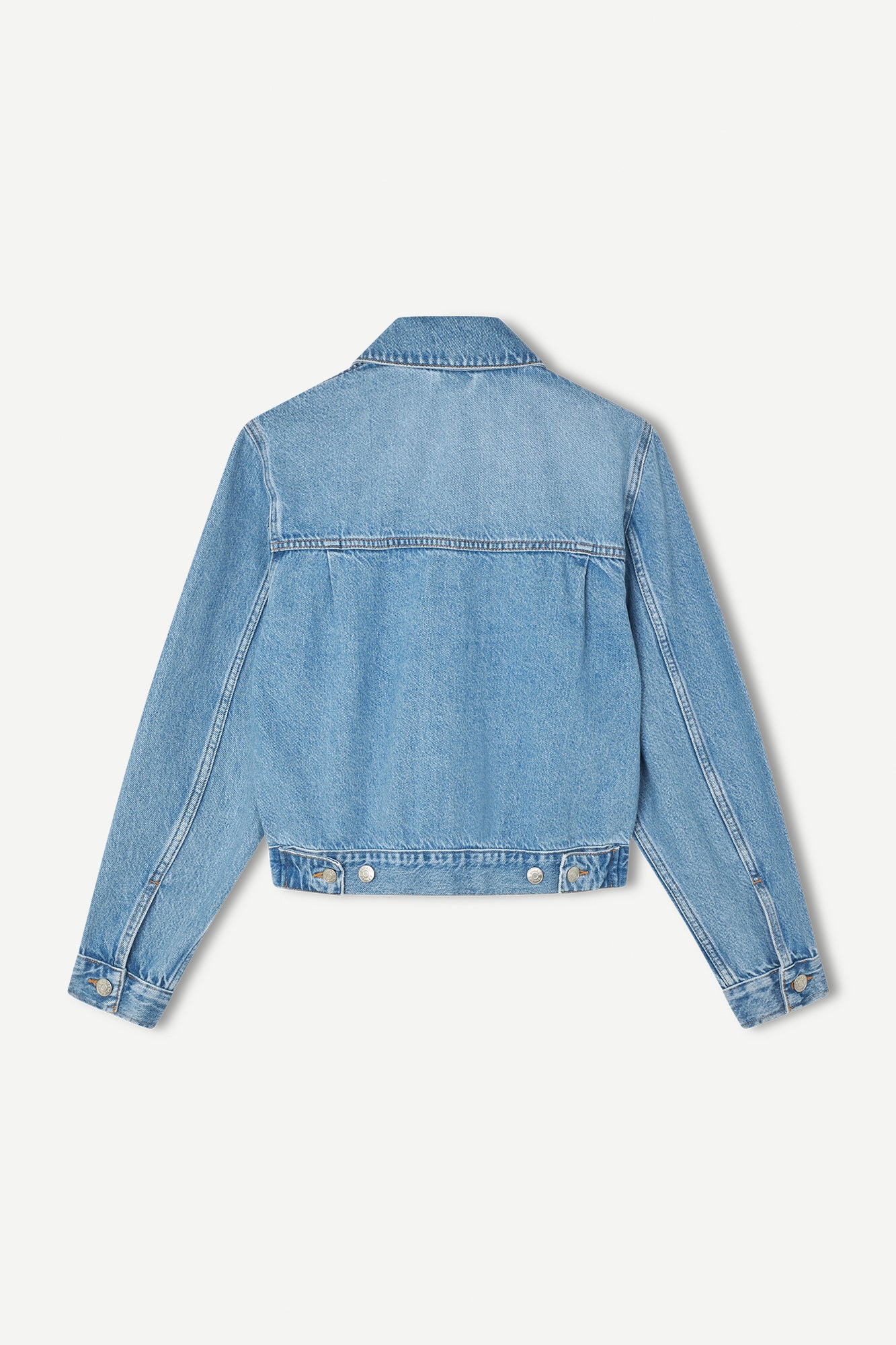 Denim jacket in ocean surf