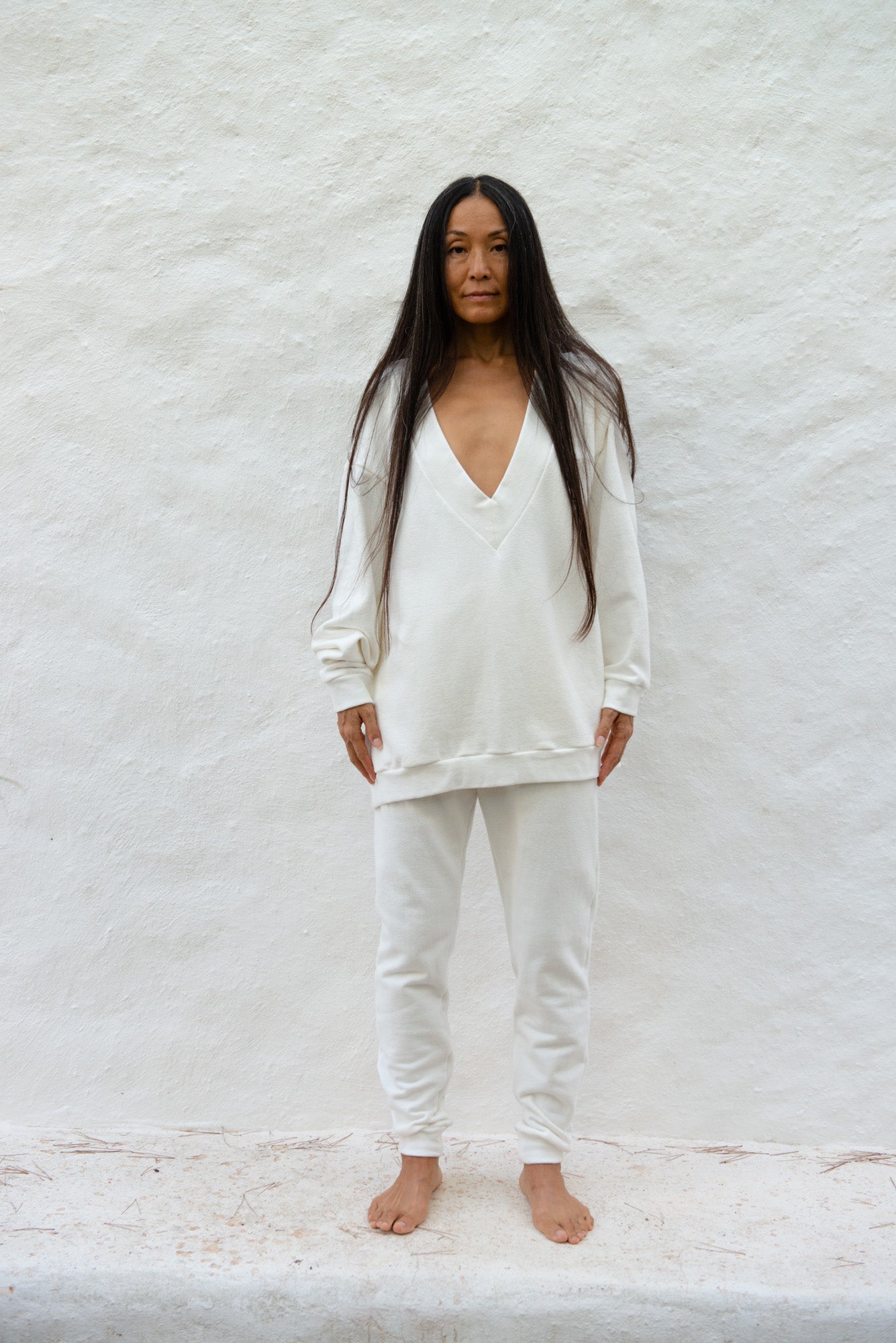 Classic V neck sweater in off white by Can Pep Rey