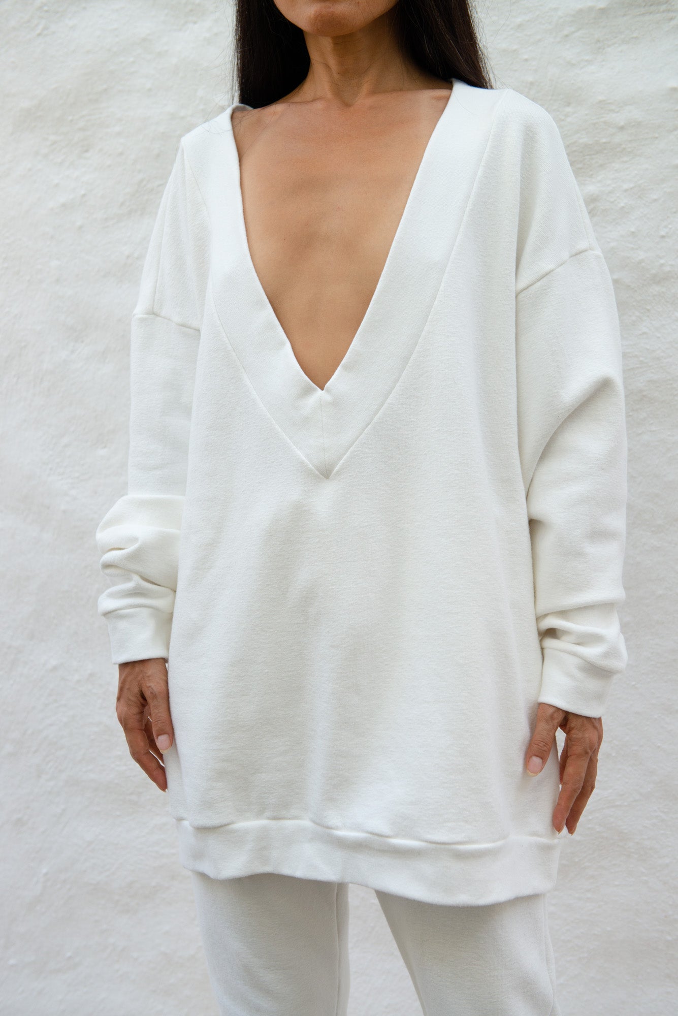 Classic V neck sweater in off white by Can Pep Rey