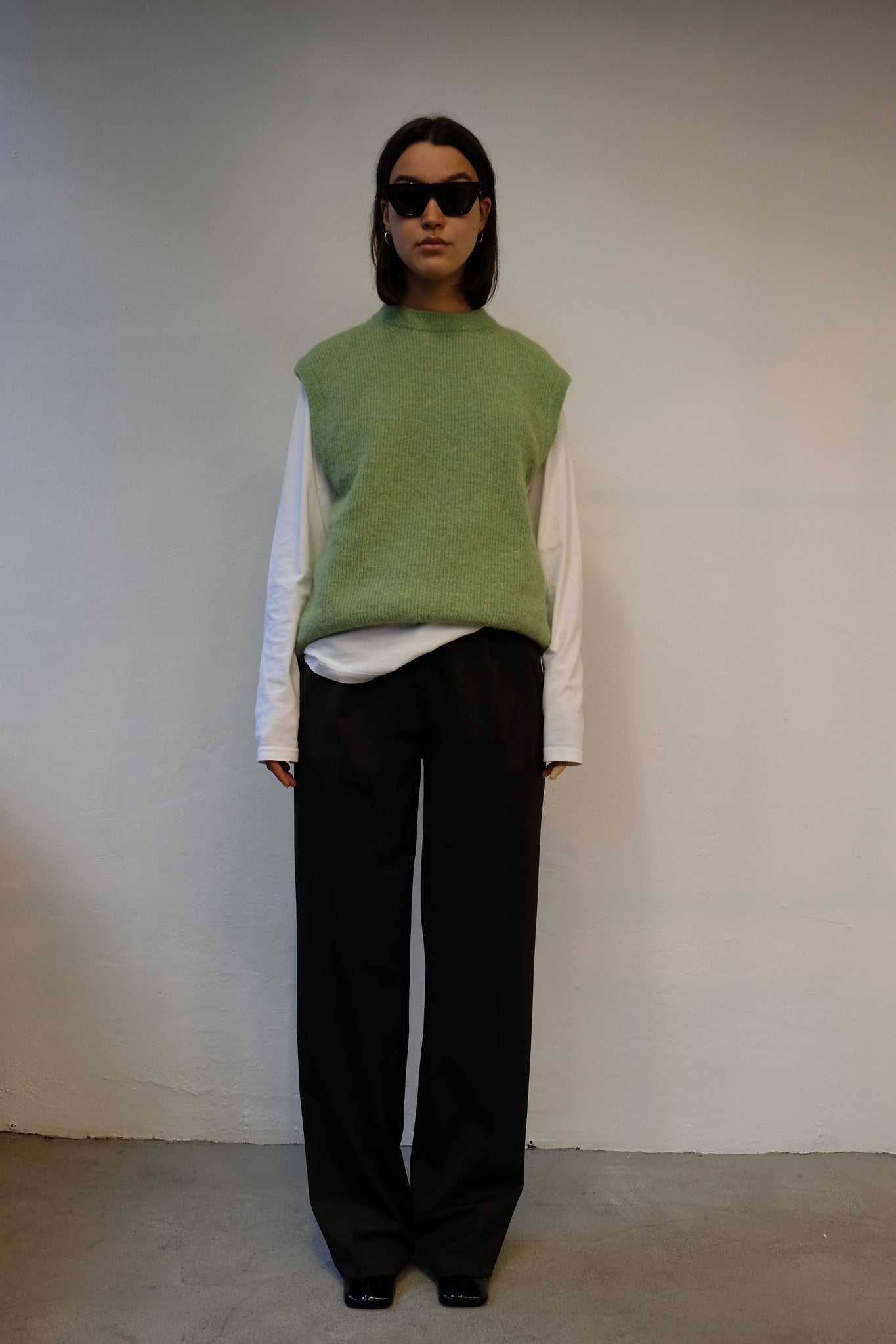 KNITTED VEST IN GREEN