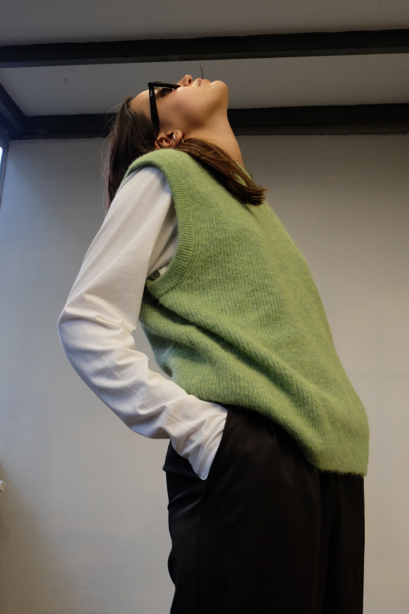 KNITTED VEST IN GREEN