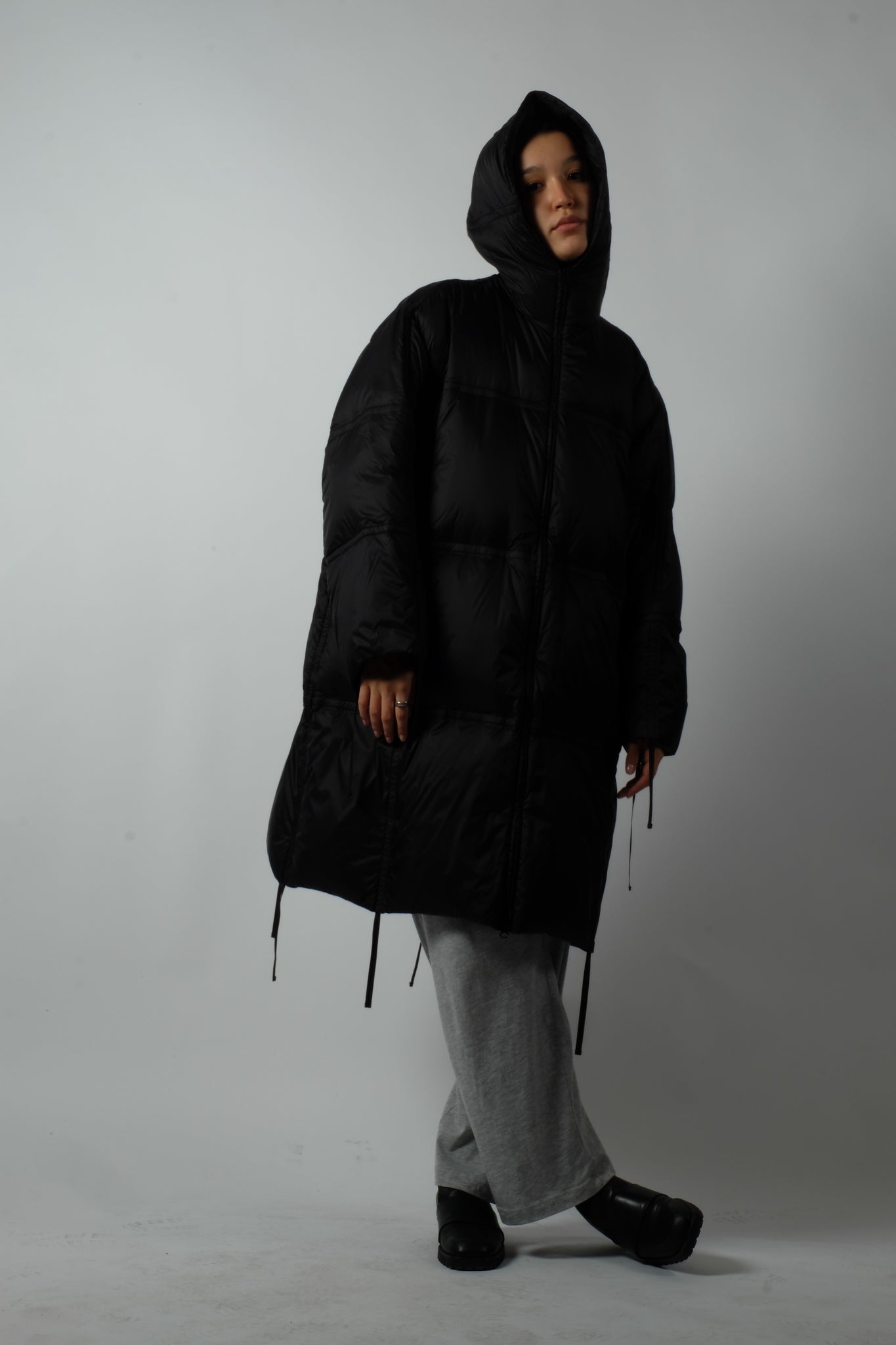 PUFFER JACKET WITH STRING DETAILS IN BLACK