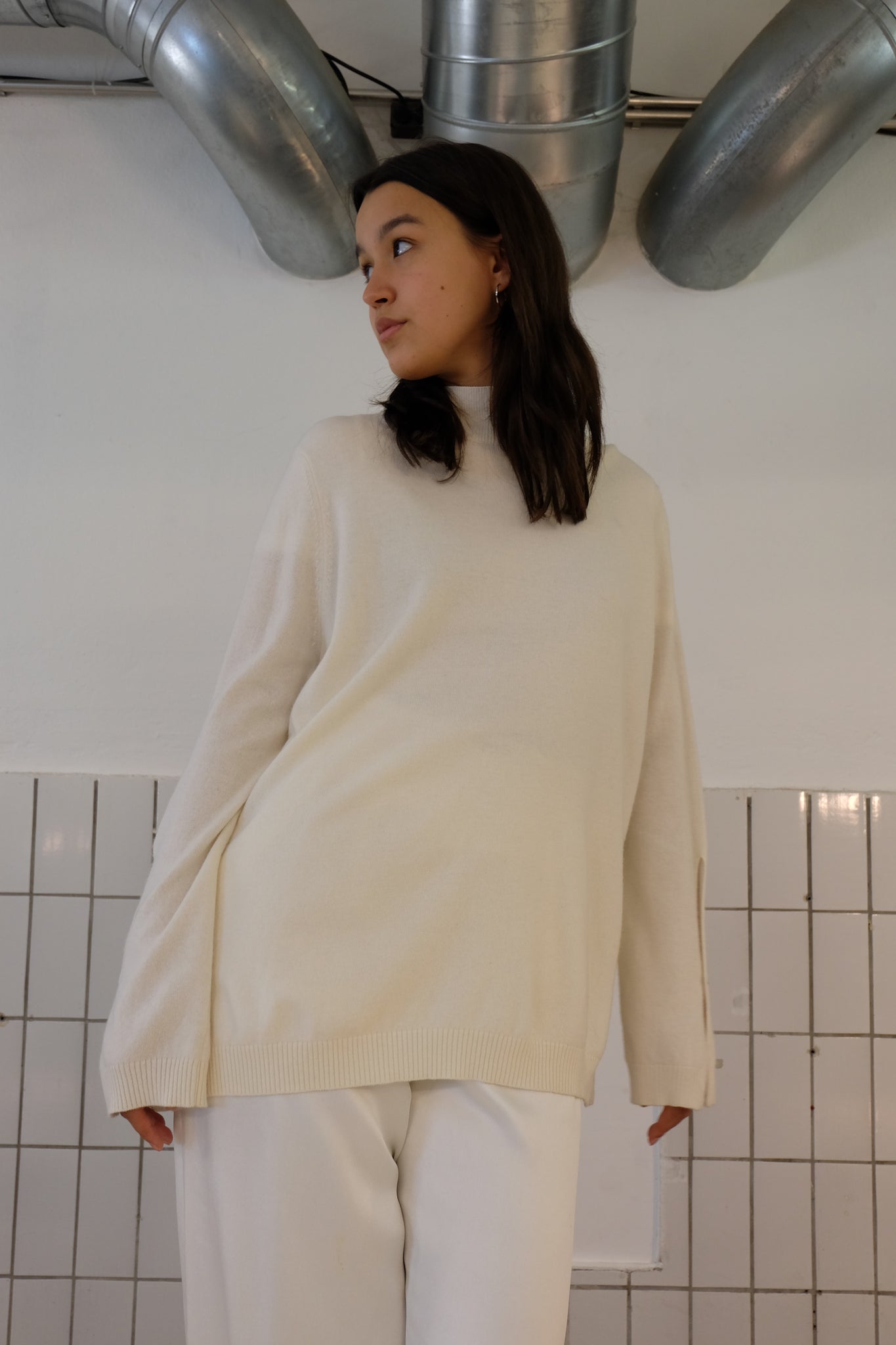 TURTLENECK KNITTED SWEATER IN IVORY WHITE