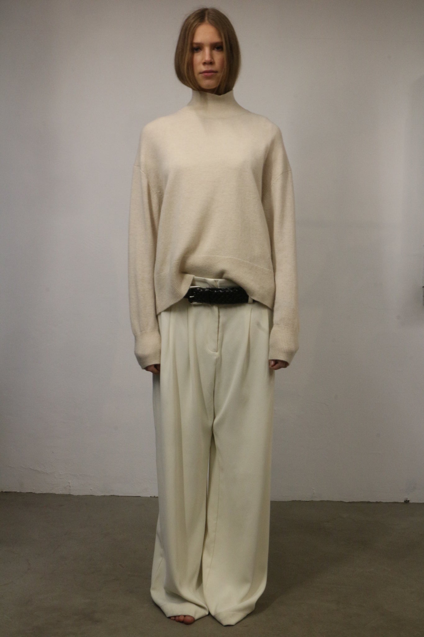 WOOL KNITTED TURTLENECK SWEATER IN IVORY WHITE