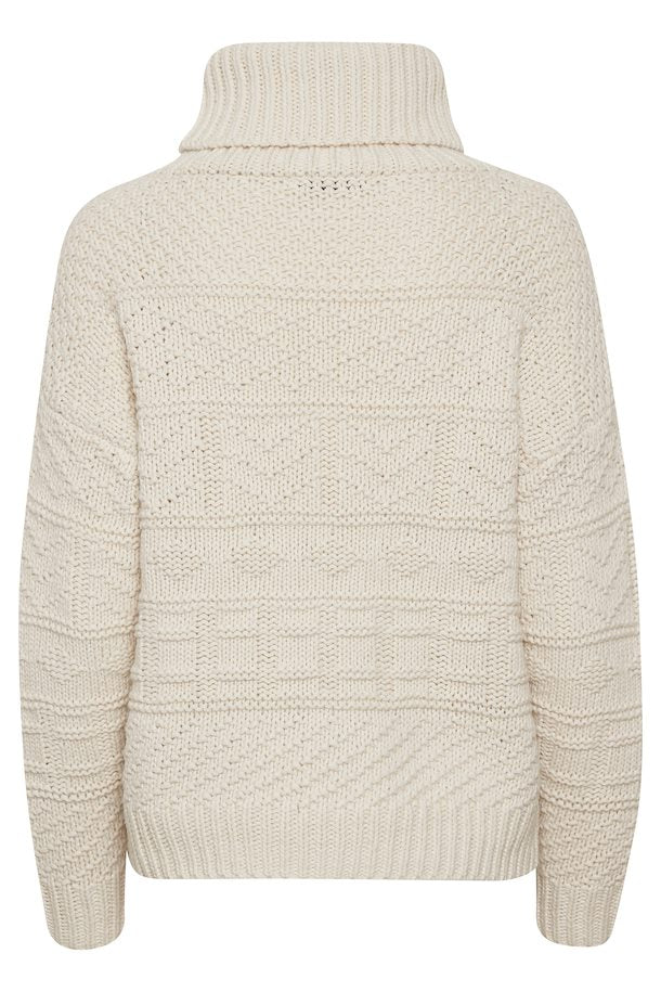 CABLE KNIT TURTLENECK SWEATER IN IVORY WHITE